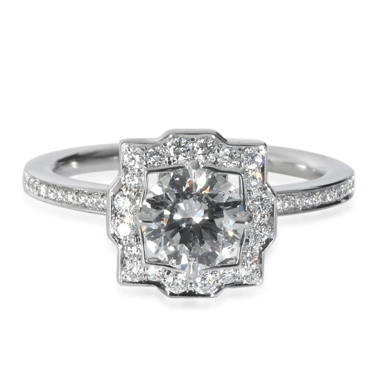 Harry Winston 0.55 ct Diamond Belle Engagement Ring: Condition: Pre-owned - Good,Shape: Round Brilliant,Country of Origin: France,With Original Box/Packaging: Yes,With Papers: Yes,Main Stone Weight (cts): 0.55,Side Stone Type: Diamond,Side Stone Weight 