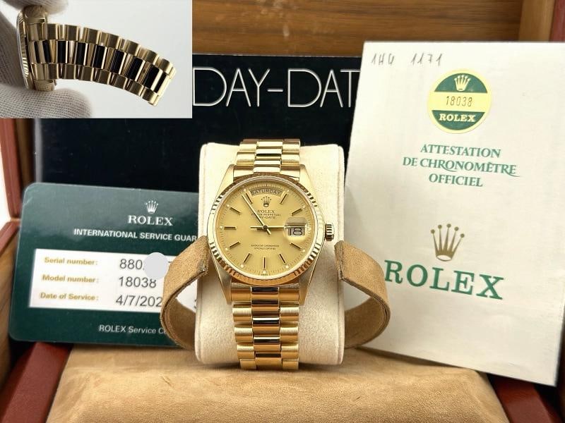 Rolex Day Date President 18038 36mm Champagne Dial 18K Yellow Gold Box Paper: Condition: Pre-owned - Excellent,Bezel Color: Gold, Yellow,Indices: Stick Indexes,Year Manufactured: 1980-1989,Band/Strap: Rolex President,Case Color: Gold, Yellow,Department: Men,Bezel Type: Fluted,W