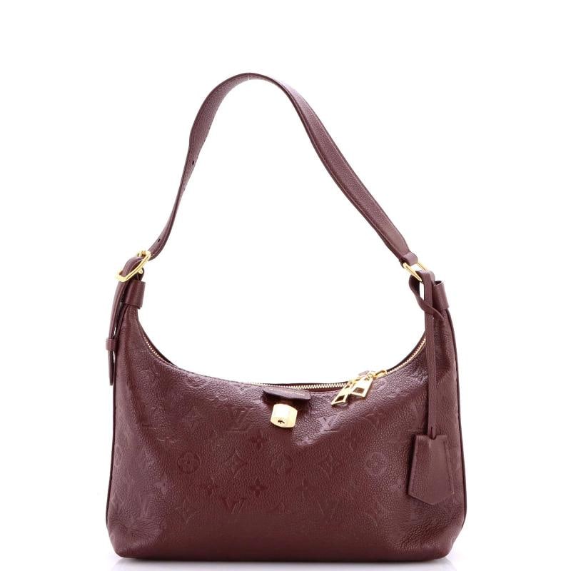 Louis Vuitton Sac Sport NM Handbag Monogram Empreinte Leather: Condition: Pre-owned - Excellent,Brand: Louis Vuitton,Exterior Material: Leather,Style: Hobos,Exterior Color: Burgundy,Department: Women,Size: Unknown,Accessories: Dust Bag, Clochette, Pochette,