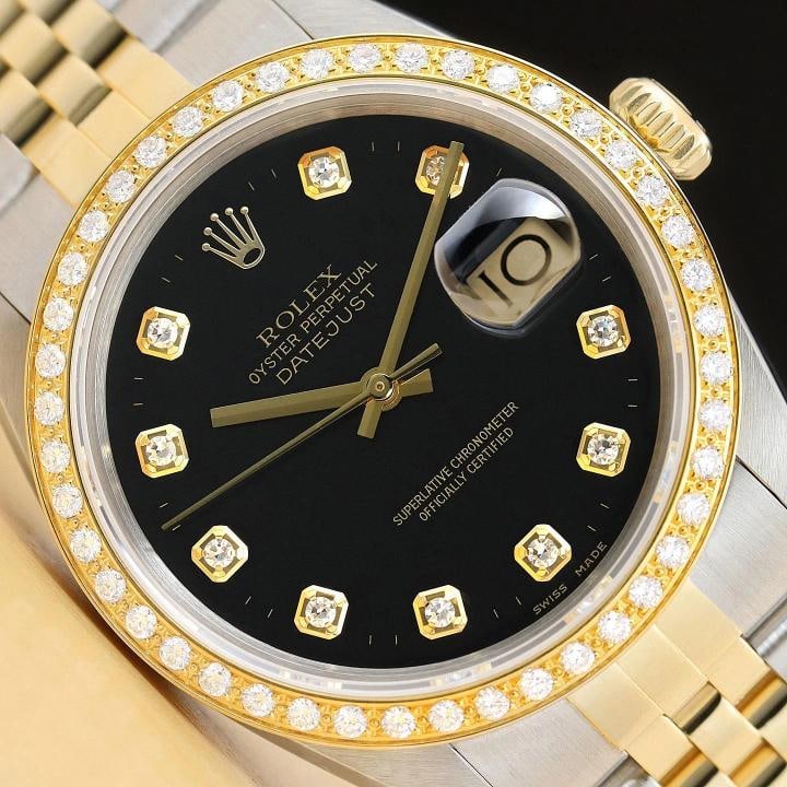 ROLEX MENS DATEJUST 16013 BLACK DIAL 18K YELLOW GOLD STEEL 2-TONE DIAMOND WATCH: This is an authentic Rolex Datejust 16013 watch with Rolex 18K yellow gold and stainless steel jubilee bracelet, Rolex dial Ref. with added genuine diamond markers, and custom 18K yellow gold diamond