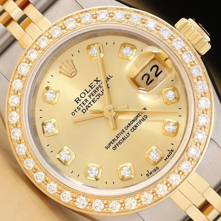 ROLEX LADIES DATEJUST CHAMPAGNE DIAMOND 18K YELLOW GOLD STAINLESS STEEL WATCH: Condition: Pre-owned - Excellent,Bezel Color: Gold,Max Wrist Size: 6.26-6.75 in,Number of Jewels: 29 Jewels,Indices: Diamond Markers, 12-Hour Dial,Band: Rolex Two Tone Jubilee Bracelet,Bezel: Custom