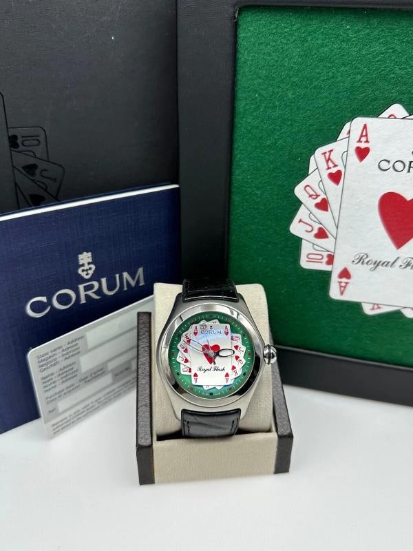 Corum Bubble Royal Flush 082.170.20 Steel Black Leather 45mm Box Paper 2006: Condition: Pre-owned - Good,Country of Origin: Switzerland,Bezel Color: Silver,Year Manufactured: 2000-2009,Band/Strap: Two-Piece Strap,Case Color: Silver,Department: Men,Caseback: Exhibition,Watch