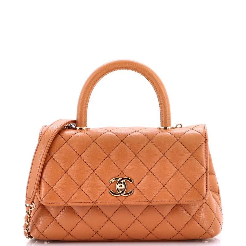 Chanel Coco Top Handle Bag Quilted Caviar with Lizard Embossed Handle Mini: Accessories: Dust Bag, With Strap Measurements: Handle Drop 3", Height 5.5", Width 9", Depth 4", Strap Drop 18" . Condition: Pre-owned - Excellent,Brand: Chanel,Exterior Material: Leather,Style: Top