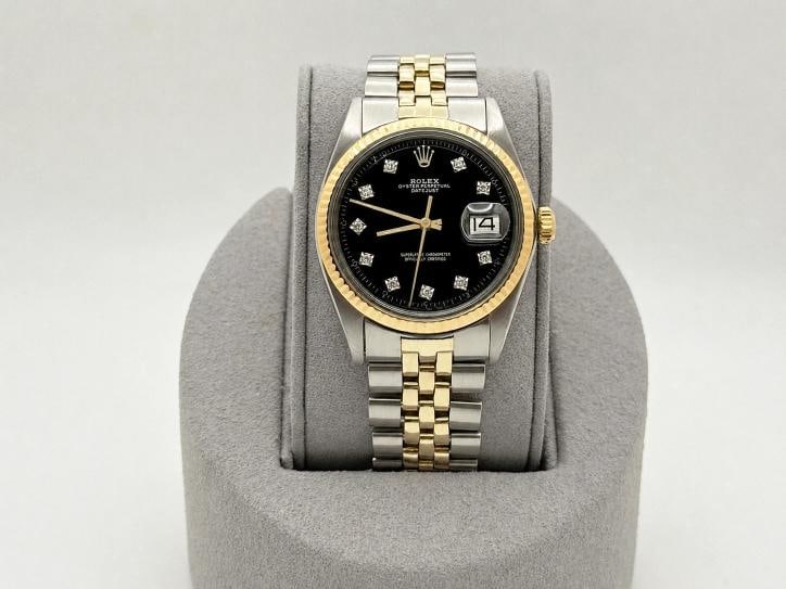 Rolex Datejust 1603 36mm Black Diamond Dial 14k Yellow Gold Stainless Steel: Style Number: 1603 Serial: 519**** Year: 1978 Model: Rolex Datejust Case Material: Stainless Steel Band: 14k Yellow Gold & Stainless Steel Jubilee Bezel: 14k Yellow Gold Dial: Custom Black Diamond