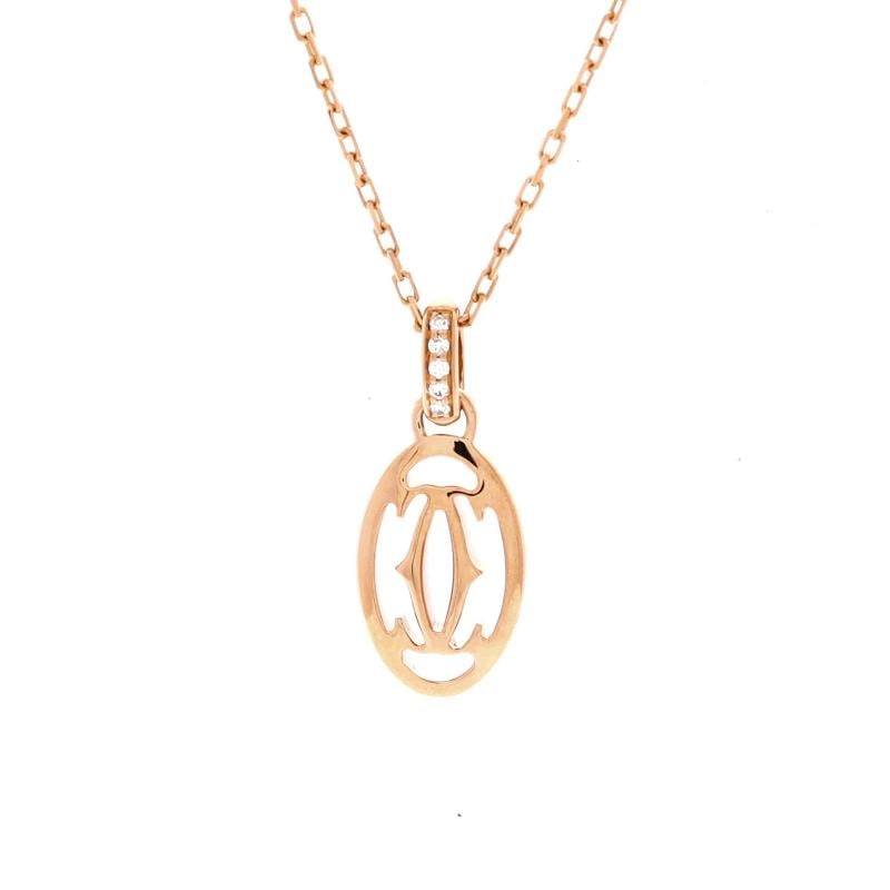 Cartier Logo Double C Pendant Necklace 18K Rose Gold with Diamonds: Condition: Pre-owned - Good,Brand: Cartier,Main Stone: Diamond,Metal: 18K Rose Gold,Metal Purity: 18K,Style: Pendant,Type: Necklace,Color: Rose Gold,Material: 18K Rose Gold Condition: Great. Minor