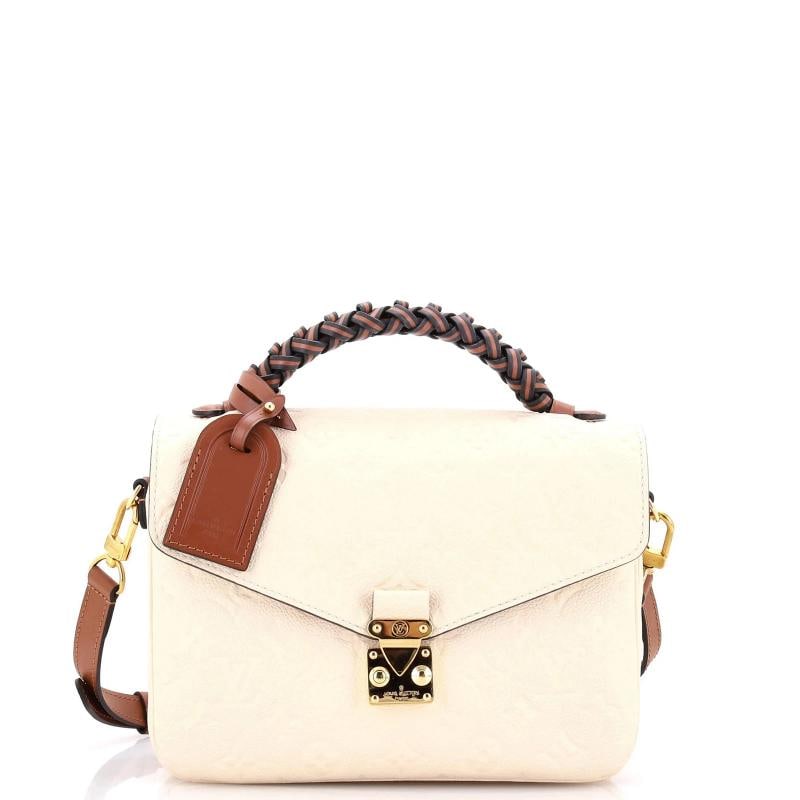 Louis Vuitton Braided Handle Pochette Metis Monogram Empreinte Leather: Condition: Pre-owned - Good,Brand: Louis Vuitton,Exterior Material: Leather,Style: Cross Body Bags,Exterior Color: Neutral,Department: Women,Size: Unknown,Accessories: Dust Bag, With Strap Condition: