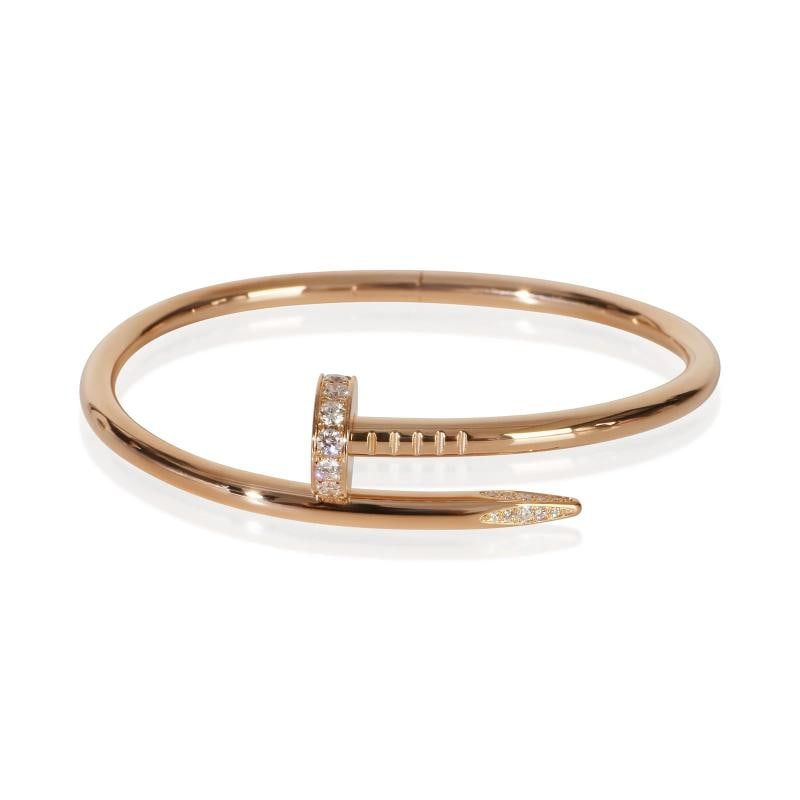 Cartier Rose Gold Diamond Juste Un Clou Bracelet: Condition: Pre-owned - Good,Shape: Round Brilliant,Item Length: 16 mm,Clasp/Buckle Type: Pusher,With Original Box/Packaging: Yes,With Papers: Yes,Side Stone Type: Diamond,Side Stone Weight (cts): 0.58