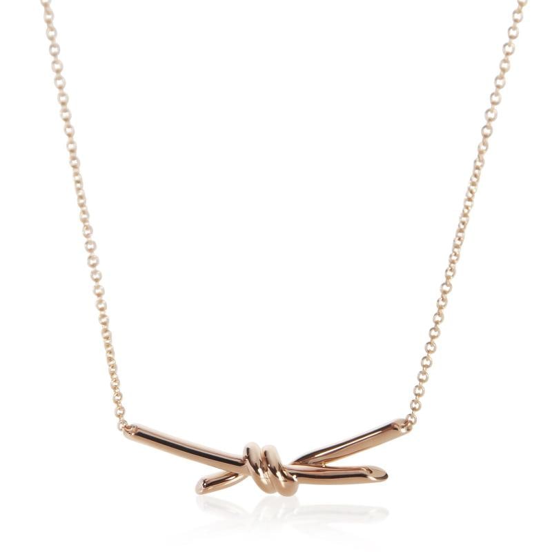 Tiffany & Co. Rose Gold Tiffany Knot Pendant: Condition: Pre-owned,Clasp/Buckle Type: Spring Ring,Side Stone Type: No Stone,Metal Purity: 18k,With Original Box/Packaging: No,With Papers: No,Gross Weight (grams): 8.23,Department: