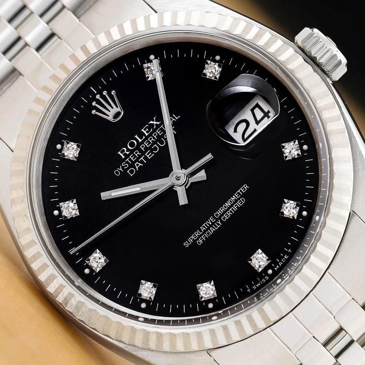 ROLEX MENS DATEJUST 16234 BLACK FACTORY DIAMOND DIAL 18K WHITE GOLD STEEL WATCH: This is an authentic Rolex Datejust 16234 watch with Rolex stainless steel jubilee bracelet, factory Rolex diamond dial Ref., and Rolex 18K white gold fluted bezel.Descriptions: Brand: Rolex Model: Da