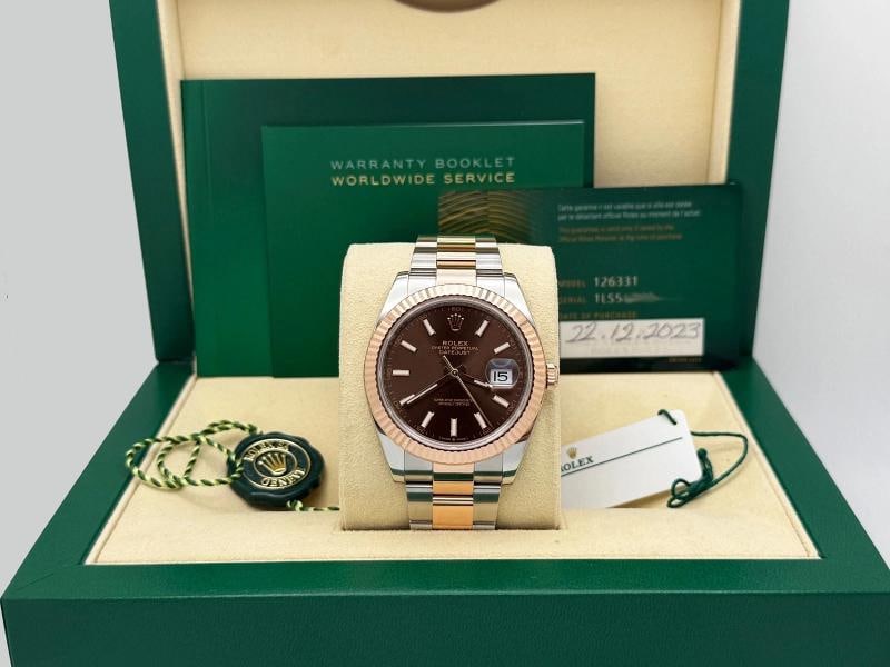 Rolex Datejust 41 126331 41mm Chocolate Dial 18k Rose Gold Steel Box Paper: Style Number: 126331 Serial: 1LS***** Year: 2023 Model: Rolex Datejust 41 Case Material: Stainless Steel Band: 18k Rose Gold & Stainless Steel Bezel: 18k Rose Gold Fluted Dial: Chocolate Dial