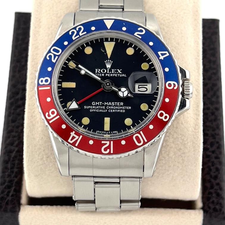 Vintage Rolex GMT-Master Pepsi 1675 40mm Red Blue Stainless Steel: Style Number: 1675 Serial: 316**** Year: 1973 Model: Rolex GMT-Master Case Material: Stainless Steel Band: Stainless Steel Bezel: Pepsi - Blue and Red Dial: Black Crystal: Acrylic Case Size: 40mm