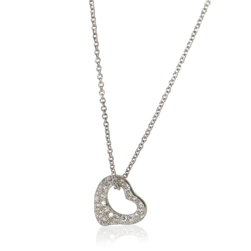 Tiffany & Co. Platinum Diamond Elsa Peretti Open Heart Pendant: Condition: Pre-owned - Good,Clasp/Buckle Type: Spring Ring,Side Stone Type: Diamond,Side Stone Weight (cts): 0.21,Metal Purity: 950,With Original Box/Packaging: No,With Papers: No,Report Type: Not
