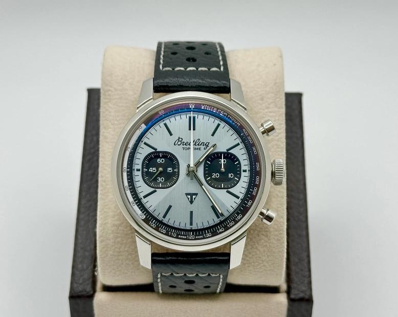 Breitling Top Time B01 Triumph AB0176 Ice Blue Dial Stainless Steel 41mm: Style Number: AB0176 Year: 2023 - 2025 Model: Breitling Top Time B01 Triumph Chronograph Case Material: Stainless Steel Band: Black Leather Bezel: Stainless Steel Dial: Ice Blue Crystal: Sapphire