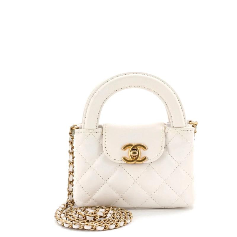 Chanel Kelly Top Handle Shopping Bag Quilted Shiny Aged Calfskin Nano: Condition: Pre-owned - Excellent,Brand: Chanel,Exterior Material: Leather,Style: Cross Body Bags,Exterior Color: White,Department: Women,Size: Nano,Accessories: Dust Bag