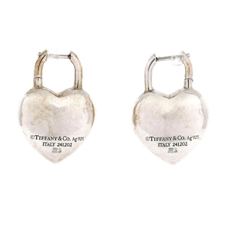Tiffany & Co. Return to Tiffany Full Heart Earrings Sterling Silver: Measurements: Height 1.2", Width 0.8" . Condition: Pre-owned - Good,Brand: Tiffany & Co.,Main Stone: Unknown,Metal: Unknown,Metal Purity: Unknown,Style: Earrings,Type: Earrings,Color: Silver,Material: