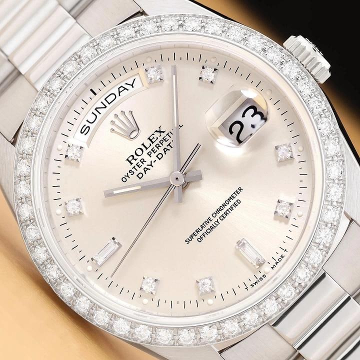 ROLEX MENS DAY-DATE PRESIDENT 18349 FACTORY DIAMOND 18K WHITE GOLD 36MM WATCH: This is an authentic Rolex Day-Date 18349 president watch with 18K white gold president bracelet, factory Rolex diamond dial, 18K white gold diamond bezel, factory Rolex box and hang tag. Descriptions