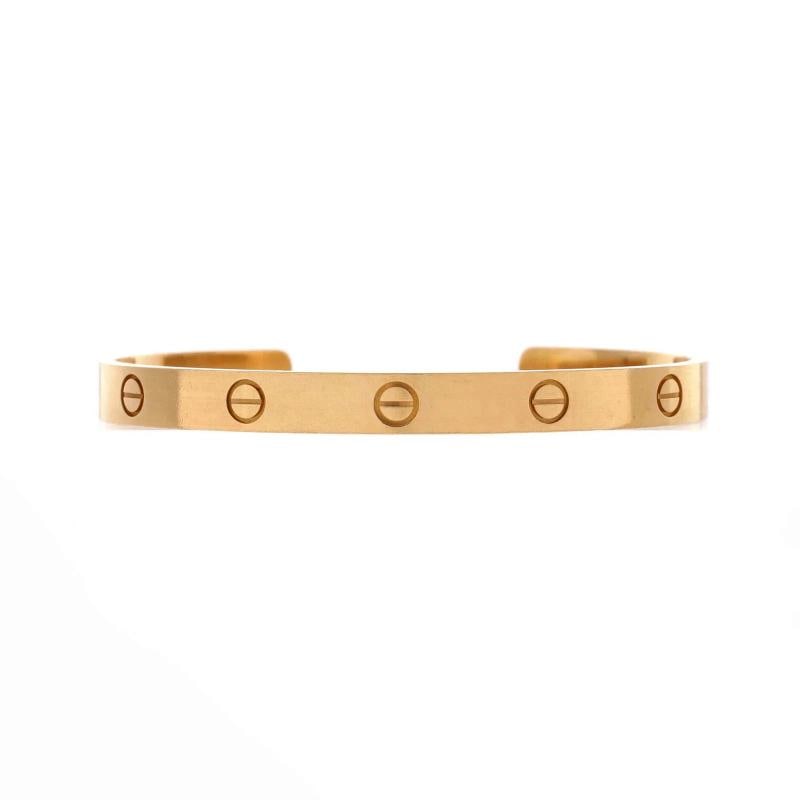 Cartier Love Cuff Bracelet 18K Yellow Gold: Condition: Pre-owned - Good,Brand: Cartier,Main Stone: Unknown,Metal: 18K Yellow Gold,Metal Purity: 18K,Style: Cuff,Type: Bracelet,Color: Yellow Gold,Material: 18K Yellow Gold Condition: Fair. Heavy w