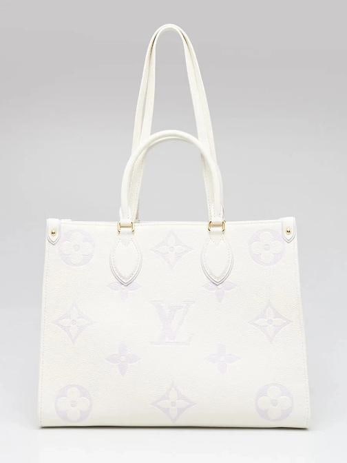 Louis Vuitton Latte/Bubble Tea Empreinte Monogram Giant Onthego MM Bag: Condition: Pre-owned - Good,Brand: Louis Vuitton,Exterior Material: Leather,Style: Everyday Bags,Totes,Exterior Color: White,Department: Women,Country of Origin: France Description This cheerful tote