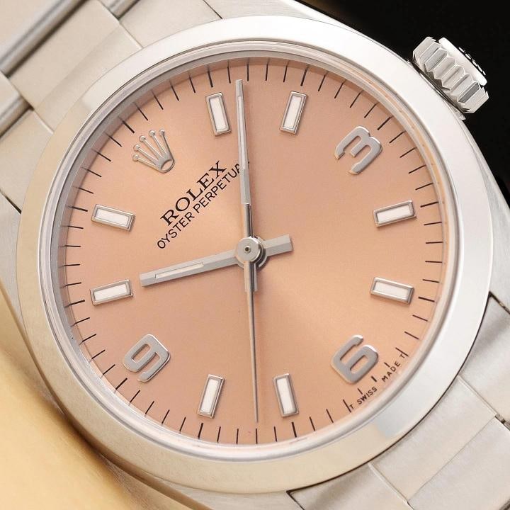 ROLEX OYSTER PERPETUAL MIDSIZE 67480 UNISEX SALMON 3-6-9 STAINLESS STEEL WATCH: Condition: Pre-owned - Excellent,Brand: Rolex,Department: Unisex,Style: Casual, Dress/Formal, Luxury, Sport, Luxury: Dress Styles,Features: 12-Hour Dial, Chronometer, Sapphire Crystal, Screwdown