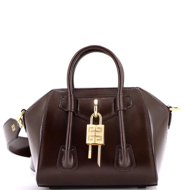 Givenchy Antigona Lock Bag Leather Toy: Condition: Pre-owned - Excellent,Brand: Givenchy,Exterior Material: Leather,Style: Cross Body Bags,Exterior Color: Brown,Department: Women,Size: Toy,Accessories: Lock, With Strap Condition: Great. Ext