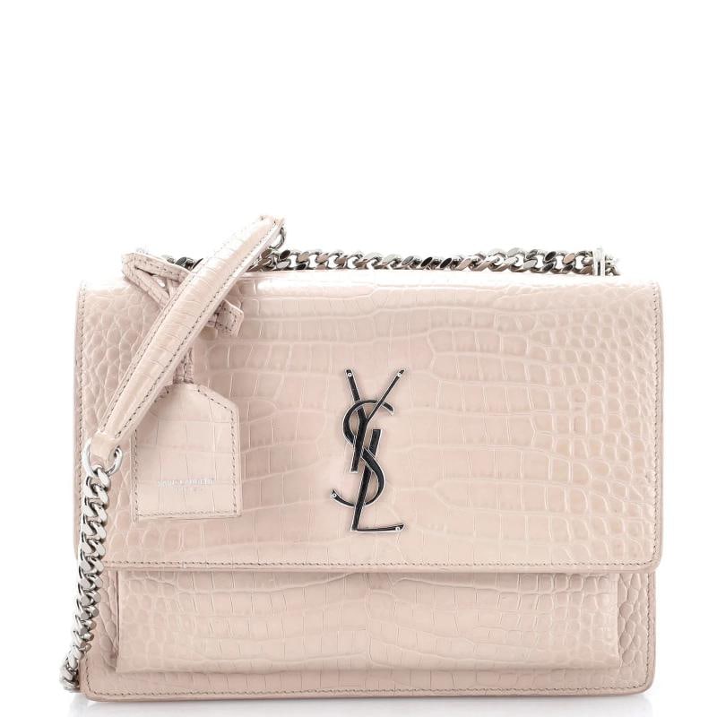 Saint Laurent Sunset Crossbody Bag Crocodile Embossed Leather Medium: Accessories: Clochette Measurements: Handle Drop 11.5", Height 6", Width 8.5", Depth 3", Strap Drop 12-20.5". Condition: Pre-owned - Good,Brand: Saint Laurent,Exterior Material: Leather,Style: Cross B