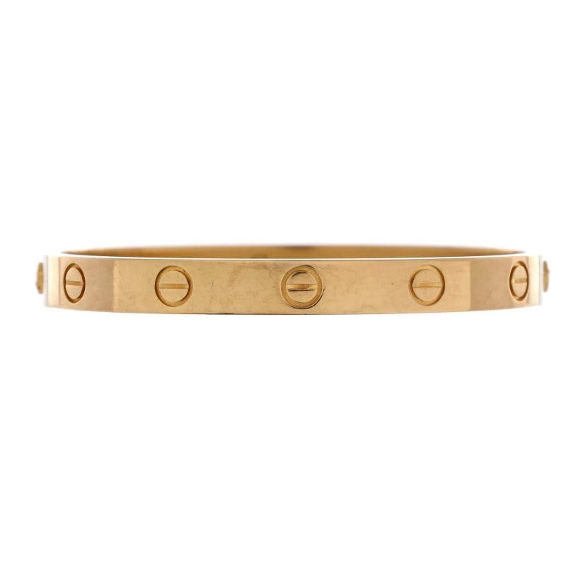 Cartier Love Bracelet 18K Yellow Gold: Measurements: Circumference: 5.80 ", Width: 5.85 mm . Condition: Pre-owned - Good,Brand: Cartier,Main Stone: Unknown,Metal: 18K Yellow Gold,Metal Purity: 18K,Style: Bracelet,Type: Bracelet,Color: Yell