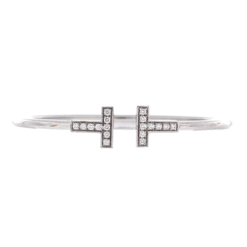 Tiffany & Co. T Wire Bracelet 18K White Gold with Diamonds: Measurements: Circumference: 6 ", Width: 2.45 mm . Condition: Pre-owned - Good,Brand: Tiffany & Co.,Main Stone: Diamond,Metal: 18K White Gold,Metal Purity: 18K,Style: Bracelet,Type: Bracelet,Color: