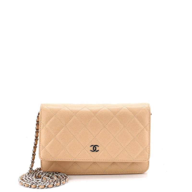 Chanel Wallet on Chain Quilted Caviar: Accessories: Dust Bag Measurements: Handle Drop 10", Height 5", Width 7.5", Depth 1", Strap Drop 25". Condition: Pre-owned - Excellent,Brand: Chanel,Exterior Material: Leather,Style: Cross Body Bags,E