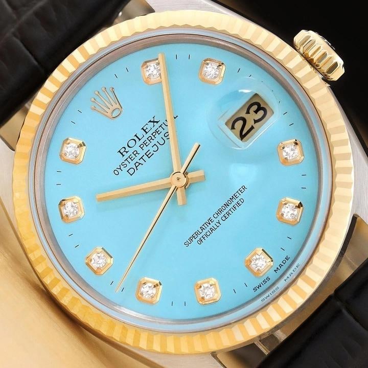 ROLEX MENS DATEJUST 16013 AQUA BLUE DIAMOND 18K GOLD STEEL BLACK LEATHER WATCH: This is an authentic Rolex Datejust 16013 watch with Rolex dial Ref. with added diamond markers, Rolex 18K yellow gold fluted bezel, and custom genuine black leather strap. Descriptions: Brand: Rolex 