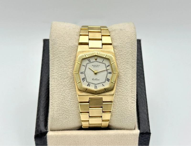 Vintage Rolex Cellini 4360 25mm White Roman Dial Octagonal 18K Yellow Gold: Style Number: 4360 Serial: 692**** Year: 1981 Model: Rolex Cellini Case Material: 18k Yellow Gold Band: 18k Yellow Gold Bezel: 18k Yellow Gold Dial: White Crystal: Sapphire Crystal Case Size: 25mm