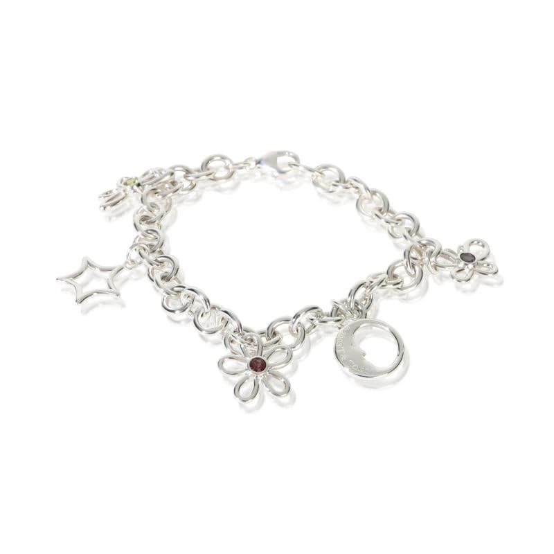 Tiffany & Co. Sterling Silver Flower, Butterfly & Dragonfly Charm Bracelet: Condition: Pre-owned,Item Length: 7.5 in,Clasp/Buckle Type: Lobster Claw,Side Stone Type: No Stone,Metal Purity: 925,With Original Box/Packaging: No,With Papers: No,Gross Weight (grams): 23.01,Departm