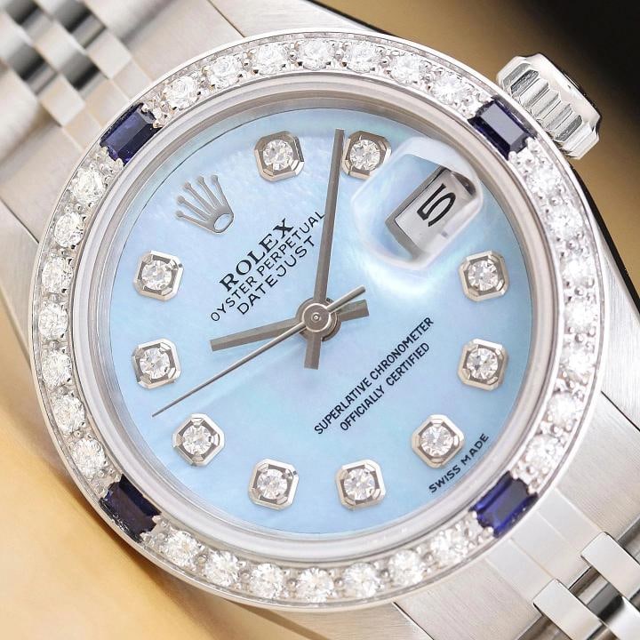 ROLEX DATEJUST 69174 ICE BLUE MOTHER OF PEARL 18K GOLD SS DIAMOND SAPPHIRE WATCH: Condition: Pre-owned - Excellent,Bezel Color: Silver,Max Wrist Size: 6.26-6.75 in,Number of Jewels: 29 Jewels,Indices: Diamond Markers, 12-Hour Dial,Band: Custom Stainless Steel Jubilee Bracelet,Bezel