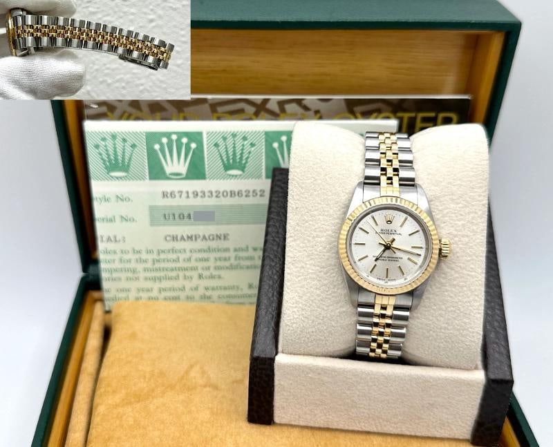 Rolex Ladies Oyster Perpetual 67193 Silver Dial 18k Yellow Gold Steel Box Paper: Style Number: 67193 Serial: U104*** Year: 1999 Model: Rolex Ladies Oyster Perpetual Case Material: Stainless Steel Band: 18K Yellow Gold & Stainless Steel Bezel: 18K Yellow Gold Dial: Factory Silver D