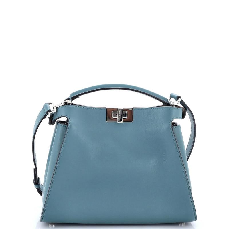 Fendi Peekaboo Essentially Bag Leather: Accessories: Dust Bag, With Strap Measurements: Handle Drop 3", Height 8", Width 10.5", Depth 4.5", Strap Drop 20-21". Condition: Pre-owned - Good,Brand: Fendi,Exterior Material: Leather,Style: Top