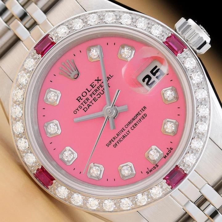 ROLEX LADIES DATEJUST 69174 PINK DIAMOND RUBY 18K WHITE GOLD STEEL JUBILEE WATCH: This is an authentic Rolex Datejust 69174 watch with Rolex stainless steel jubilee bracelet, Rolex dial Ref. with added diamond markers, and custom 18K white gold diamond and ruby bezel. Descriptions: