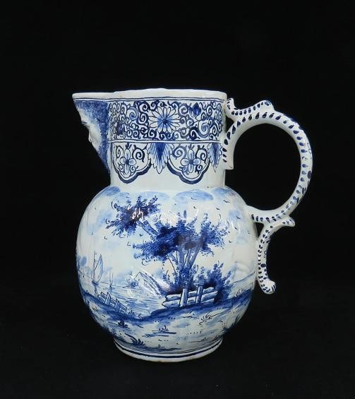 Fine Old 1700s Delft Faience Blue White Scenic Mask Jug Pitcher: The jug stands about 8 1/4 inches tall, measures about 6 1/4 inches in diameter around the body, or about 8 1/4 inches from the back of the handle to the tip of the spout.
