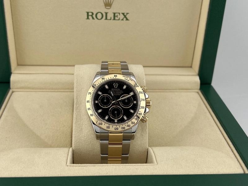 Rolex Daytona Cosmograph 116523 40mm Black Dial 18k Yellow Gold Steel Box: Condition: Pre-owned - Good,Country of Origin: Switzerland,Bezel Color: Gold, Yellow,Movement: Mechanical (Automatic),Seller Warranty: Yes,Year Manufactured: 2010-2019,Band/Strap: Rolex Oyster,Referen