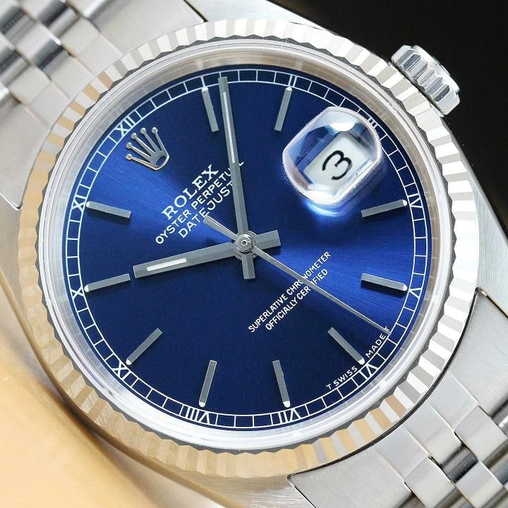 MENS ROLEX DATEJUST 16234 BLUE DIAL 18K WHITE GOLD STAINLESS STEEL WATCH: Condition: Pre-owned - Excellent,Bezel Color: Silver,Max Wrist Size: 7.26-7.5 in,Number of Jewels: 31 Jewels,Indices: Stick Indexes, 12-Hour Dial,Bezel: Rolex 18K White Gold Fluted Bezel,Band/Strap: