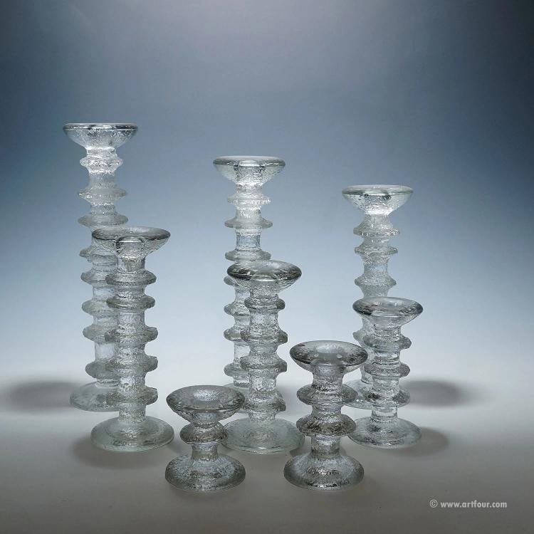 Vintage Festivo Candle Sticks by Timo Sarpaneva for Iittala: Condition: Used,Brand: ArtGlass,Type: Candlestick A vintage set of eight Festivo candle sticks designed by Timo Sarpaneva for Iittala in 1966. A total of 8 different heights were made that can be
