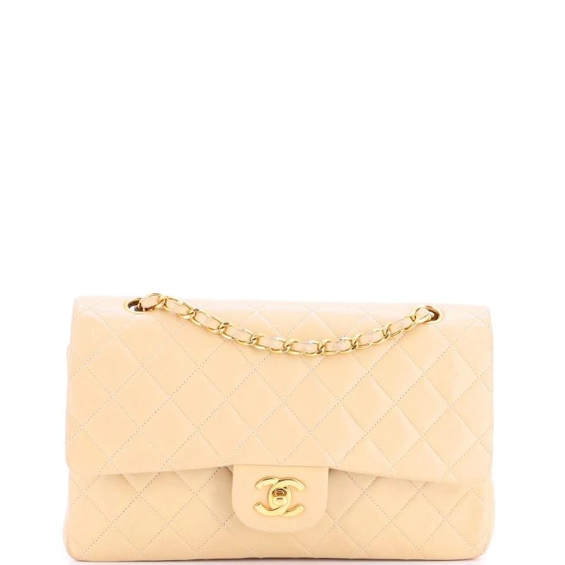 Chanel Classic Double Flap Bag Quilted Lambskin Medium: Accessories: Authenticity Card Measurements: Handle Drop 9", Height 6", Width 11", Depth 3", Strap Drop 16". Condition: Pre-owned - Good,Brand: Chanel,Exterior Material: Leather,Style: Shoulder