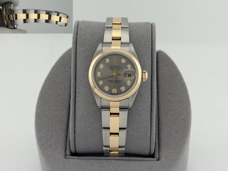 Rolex Ladies Datejust 79163 26mm Silver Diamond Dial 18k Yellow Gold Steel: Style Number: 79163 Serial: A19**** Year: 1999 Model: Rolex Ladies Datejust Case Material: Stainless Steel Band: 18k Yellow Gold & Stainless Steel Bezel: 18k Yellow Gold Dial: Factory Silver Diamond D