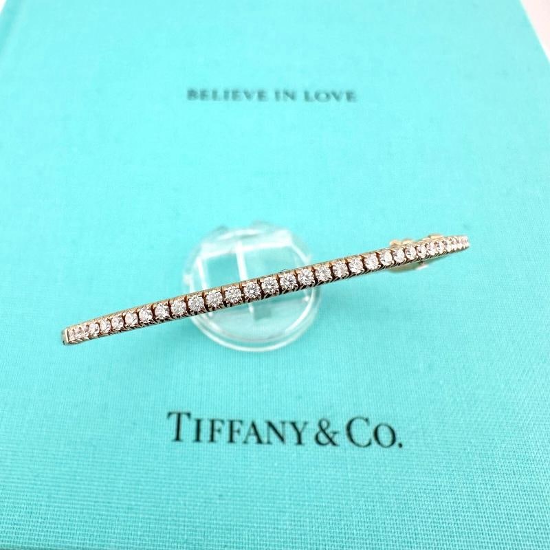 Tiffany & Co 18k Rose Gold Diamond Metro Hinged Bangle Bracelet: Style: Bangle Ref. number: 6006146 Metal: 18k Rose Gold Size: Small - 6' Inches TCW: 0.61 tcw Main Diamond: 41 Round Brilliant Diamonds Hallmark: Ã‚Â©TIFFANY&CO. Au750 ITALY Inclu