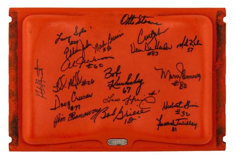1972 Miami Dolphins Super Bowl Champs Team Signed Orange Bowl Seatback JSA COA: Eighteen former Dolphins including Pro Football Hall of Famers Bob Griese, Nick Buoniconti and fellow stars Al Jenkins, Curtis Johnson, Marv Fleming, Garo Yepremian, Larry Seiple, Lloyd Mumphord,