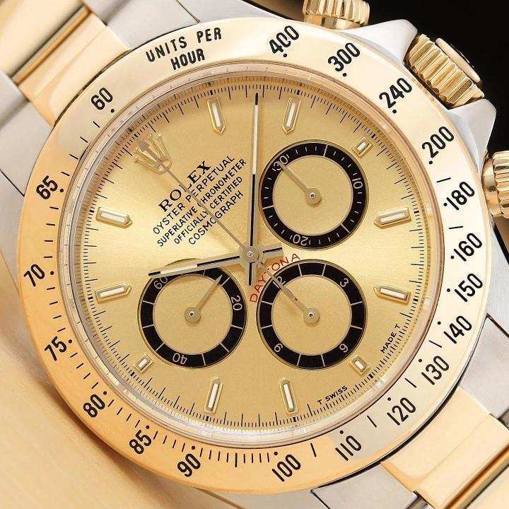 ROLEX DAYTONA COSMOGRAPH ZENITH 16523 CHAMPAGNE DIAL 18K GOLD STEEL OYSTER WATCH: This is an authentic Rolex Daytona Cosmograph Zenith 16523 40mm watch with champagne chronograph dial, 18K yellow gold bezel, 18K yellow gold and stainless steel oyster bracelet. Descriptions: Brand: 