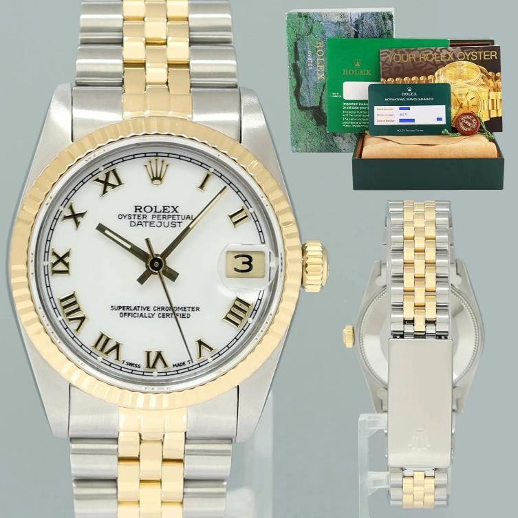 2018 RSC PAPERS Ladies Rolex 68273 Two Tone Gold White Roman Steel 31mm Watch: Case & Dial Case Material: Rolex Two-Tone Yellow Gold & Stainless Steel Case Size: 31mm Bezel: Rolex Yellow Gold Fluted Crystal: Rolex Sapphire Dial: Rolex White Roman Movement & Bracelet Movement: