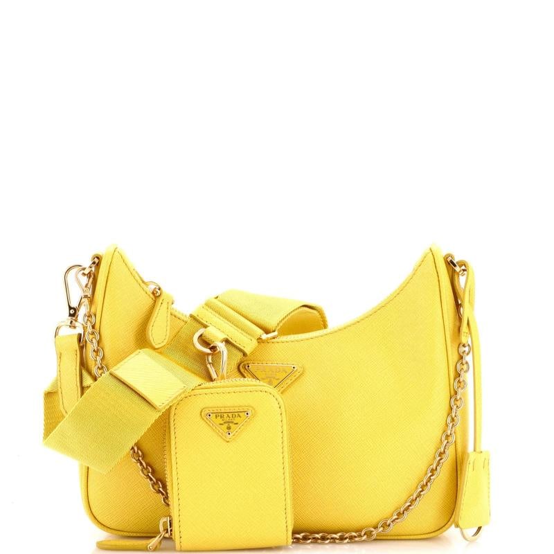 Prada Re-Edition 2005 Shoulder Bag Saffiano Leather Small: Accessories: Extra Strap, Pochette, Dust Bag, Clochette, With Strap Measurements: Handle Drop 9.5", Height 5", Width 8.5", Depth 2.5", Strap Drop 15-21.5". Condition: Pre-owned - Good,Brand: Prada,Ext