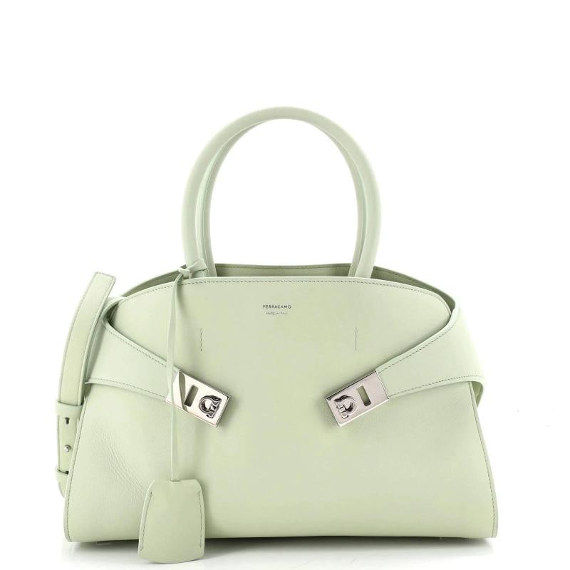 Salvatore Ferragamo Hug Top Handle Bag Leather Small: Accessories: Dust Bag, Clochette, With Strap Measurements: Height 7.5", Width 12.5", Depth 6.5". Condition: Pre-owned - Good,Brand: Salvatore Ferragamo,Exterior Material: Leather,Style:
