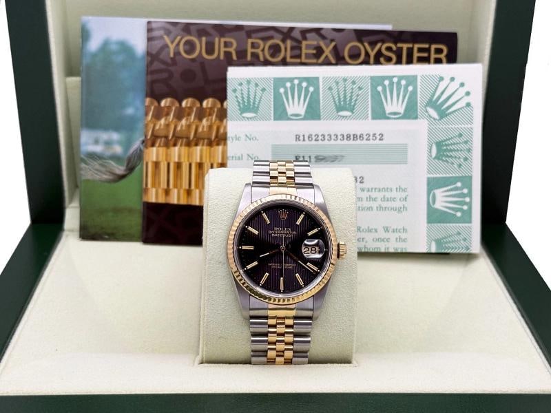 Rolex Datejust 16233 36mm Black Tapestry Dial 18k Yellow Gold Steel Box Paper: Condition: Pre-owned - Good,Bezel Color: Gold, Yellow,Dial Pattern: Tapisserie,Indices: Stick Indexes,Year Manufactured: 1990-1999,Band/Strap: Rolex Jubilee,Case Color: Silver,Department: Men,Bezel Ty