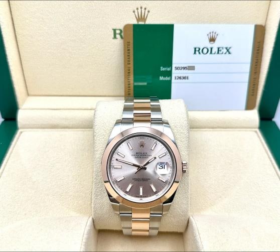 Rolex Datejust 41 126301 Sundust Dial 18K Rose Gold Stainless Steel Box Paper: Style Number: 126301 Year: 2019 Model: Rolex Datejust 41 Case Material: Stainless Steel Band: 18K Rose Gold & Stainless Steel Bezel: 18K Rose Gold Dial: Sundust Pink Crystal: Sapphire Crystal Case Siz