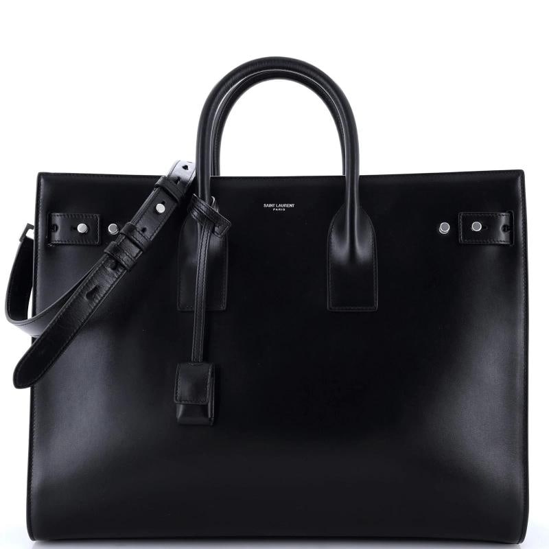 Saint Laurent Sac de Jour Souple Bag Leather Large: Condition: Pre-owned - Good,Brand: Saint Laurent,Exterior Material: Leather,Style: Top Handle,Exterior Color: Black,Department: Women,Size: Large,Accessories: Keys, Dust Bag, Lock, Clochette, With